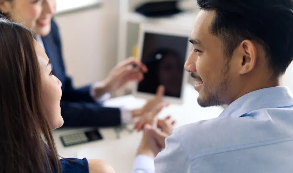 A couple receiving investment advice